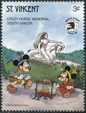 Сент-Винсент. 1989. Диснеевские персонажи. Мемориал Неистового Коня (Почтовая марка. MNH OG)