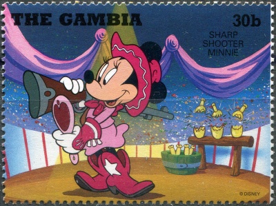Гамбия. 1995. Меткий стрелок - Минни (Почтовая марка. MNH OG)