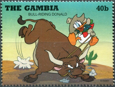 Гамбия. 1995. Езда верхом на быке - Дональд (Почтовая марка. MNH OG)