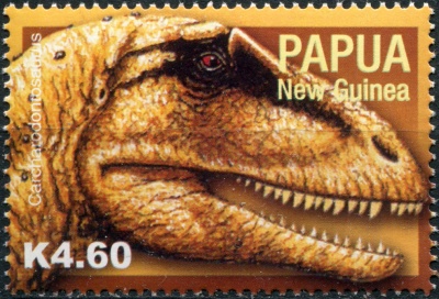 Папуа Новая Гвинея. 2004. Кархародонтозавр (Почтовая марка. MNH OG)