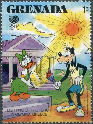 Гренада. 1988. Гуфи и Дейзи Дак зажигают олимпийский факел (Почтовая марка. MNH OG)